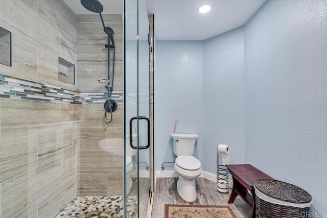 1315 Hermana Ct, Vista, CA 92084 - full bath with a stall shower, toilet, wood finished floors, baseboards, and recessed lighting