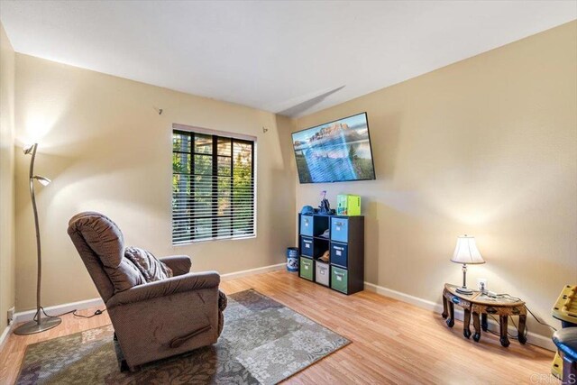 1315 Hermana Ct, Vista, CA 92084 - living area featuring wood finished floors and baseboards