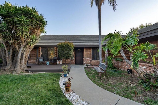 1315 Hermana Ct, Vista, CA 92084 - view of front facade featuring a front lawn and brick siding