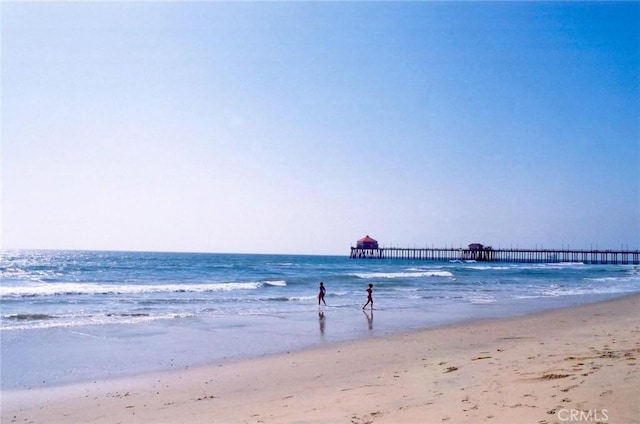property view of water featuring a view of the beach