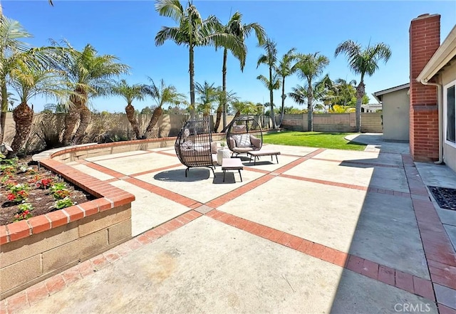 view of patio featuring a fenced backyard