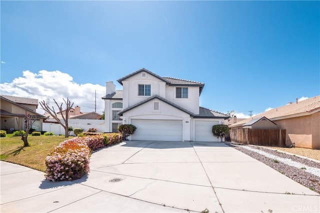 traditional-style home with fence, stucco siding, an attached garage, driveway, and a tile roof