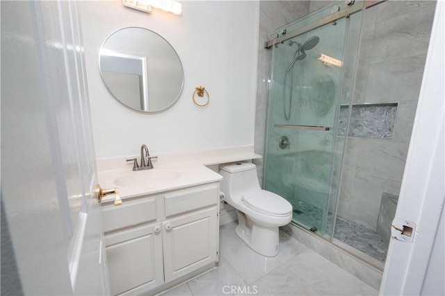 full bath with toilet, a shower stall, marble finish floor, and vanity