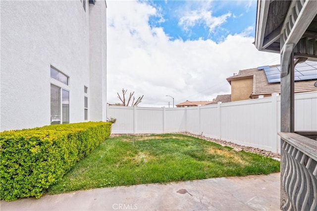 view of yard with a fenced backyard and a patio area