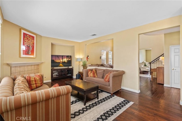 8309 Clover Creek Rd, Riverside, CA 92508 - living room featuring hardwood / wood-style floors, baseboards, and stairs