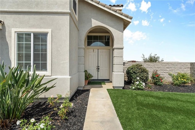 8309 Clover Creek Rd, Riverside, CA 92508 - entrance to property with stucco siding and a yard