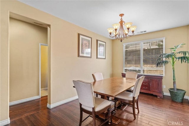 8309 Clover Creek Rd, Riverside, CA 92508 - dining room with baseboards, dark wood finished floors, and a chandelier