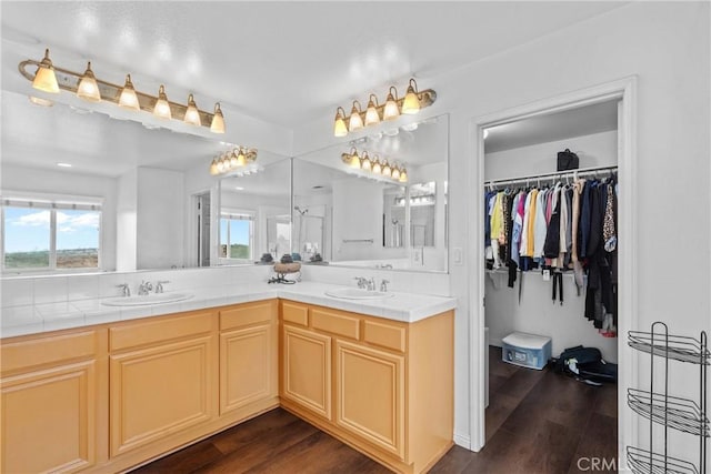 8309 Clover Creek Rd, Riverside, CA 92508 - full bath featuring double vanity, wood finished floors, and a walk in closet
