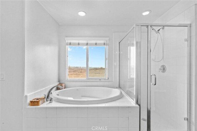 8309 Clover Creek Rd, Riverside, CA 92508 - bathroom featuring a bath, a stall shower, and recessed lighting