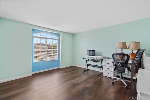 8309 Clover Creek Rd, Riverside, CA 92508 - home office with dark wood-type flooring and baseboards