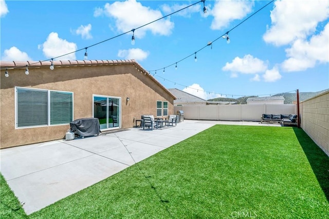 29101 Long Horn Ln, Winchester, CA 92596 - back of property featuring a yard, a patio, a fenced backyard, and stucco siding