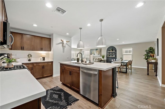 29101 Long Horn Ln, Winchester, CA 92596 - kitchen featuring visible vents, appliances with stainless steel finishes, a center island with sink, a sink, and recessed lighting