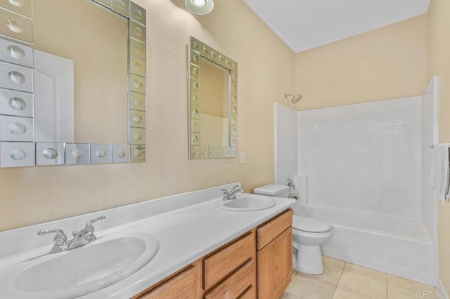 full bathroom with a sink, tile patterned floors, toilet, and bathing tub / shower combination