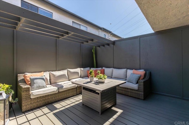wooden deck featuring an outdoor living space