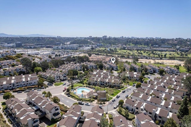 bird's eye view featuring a residential view and a mountain view