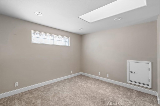 1128 Grass Valley Way, Santa Maria, CA 93454 - empty room with carpet floors, recessed lighting, a skylight, and baseboards