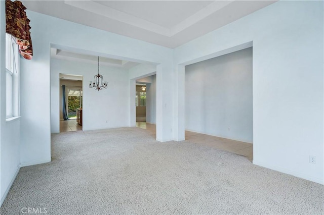 2612 Silverwood Way, Paso Robles, CA 93446 - empty room featuring a chandelier, carpet, and a raised ceiling