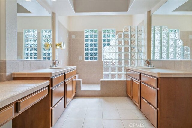 2612 Silverwood Way, Paso Robles, CA 93446 - bathroom featuring two vanities, tile patterned floors, and walk in shower