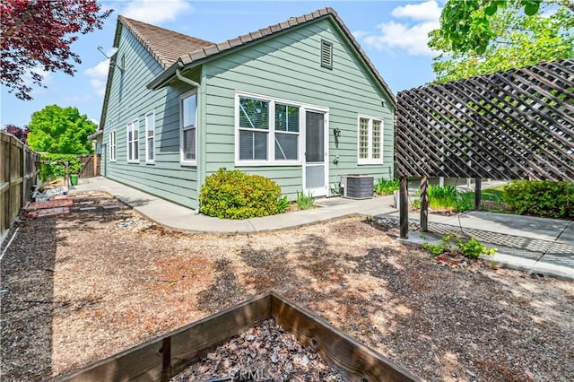 2612 Silverwood Way, Paso Robles, CA 93446 - view of side of property with a patio, central air condition unit, a fenced backyard, and a tile roof