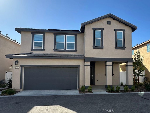 2511 Gunner Ridge Way, Rialto, CA 92377 - traditional home featuring stucco siding and an attached garage