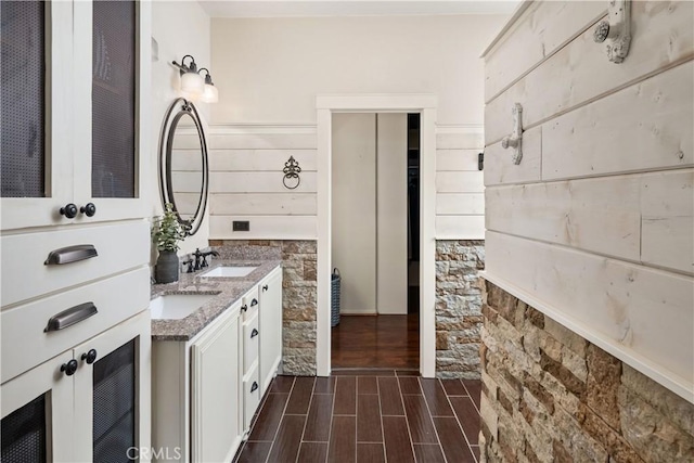 27975 Langley Pl, Castaic, CA 91384 - full bathroom featuring wood tiled floors and double vanity