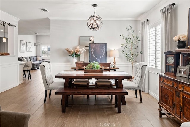 27975 Langley Pl, Castaic, CA 91384 - dining space with crown molding and light wood-type flooring