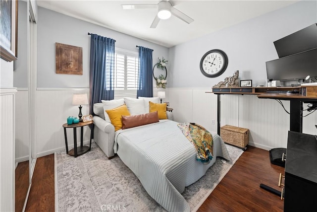27975 Langley Pl, Castaic, CA 91384 - bedroom with wainscoting, wood finished floors, and a ceiling fan