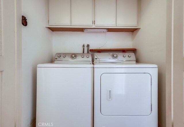 814 S Patton Ave Unit 2, San Pedro, CA 90731 - laundry area featuring separate washer and dryer and cabinet space