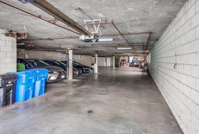 814 S Patton Ave Unit 2, San Pedro, CA 90731 - parking deck featuring concrete block wall and a garage door opener