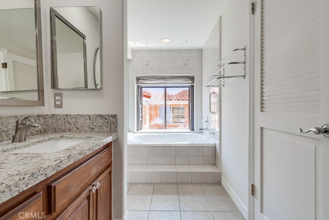 814 S Patton Ave Unit 2, San Pedro, CA 90731 - bathroom with tile patterned flooring, a garden tub, and vanity