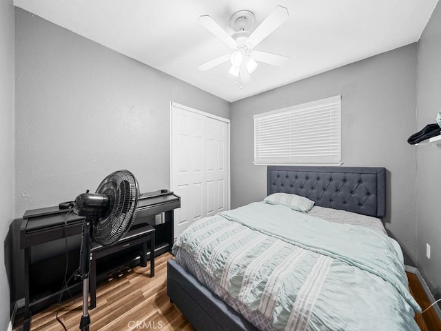 10478 Nutmeg St, Rancho Cucamonga, CA 91730 - bedroom featuring baseboards, ceiling fan, wood finished floors, and a closet
