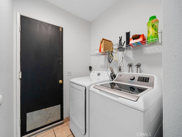 10478 Nutmeg St, Rancho Cucamonga, CA 91730 - laundry room featuring laundry area, light tile patterned flooring, and washer and clothes dryer