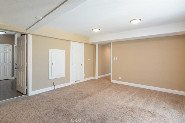finished below grade area featuring carpet floors and baseboards