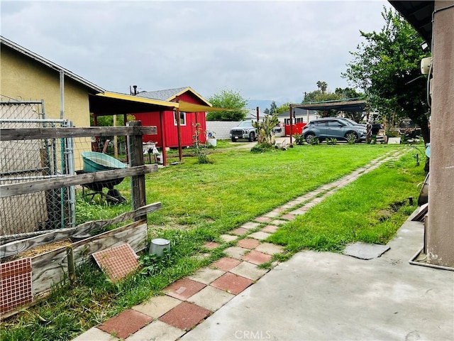 view of yard with fence