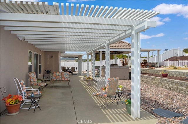 view of patio featuring a pergola and a fenced backyard