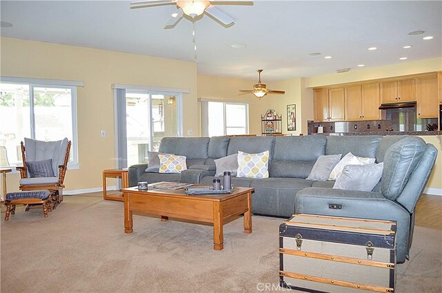 38256 Wild Poppy Ln, Yucaipa, CA 92399 - living room with a ceiling fan, light colored carpet, baseboards, and recessed lighting