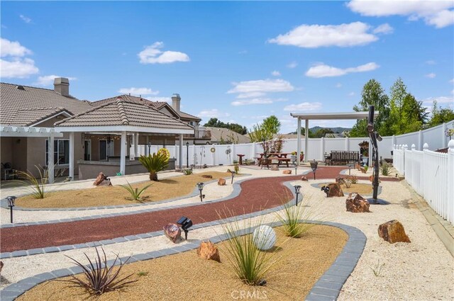 38256 Wild Poppy Ln, Yucaipa, CA 92399 - view of community with a patio and a fenced backyard