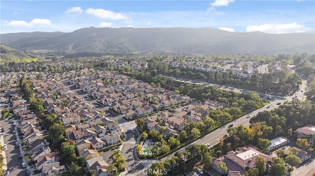 drone / aerial view with a residential view and a mountain view