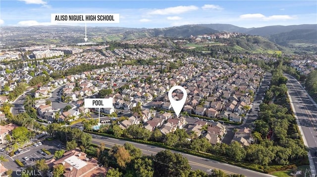 aerial view with a residential view and a mountain view