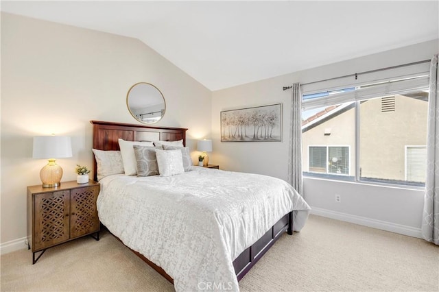 bedroom featuring carpet flooring, baseboards, visible vents, and lofted ceiling