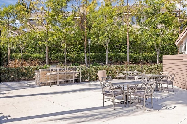 view of patio with outdoor dining area