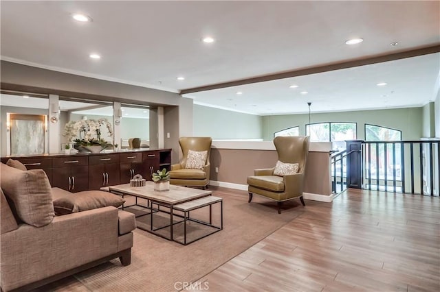 838 Pine Ave Unit 202, Long Beach, CA 90813 - living area with crown molding, baseboards, recessed lighting, and light wood finished floors