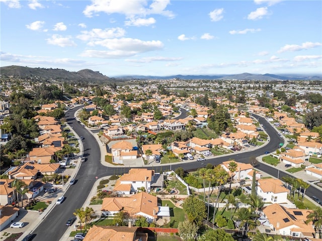 bird's eye view with a residential view and a mountain view