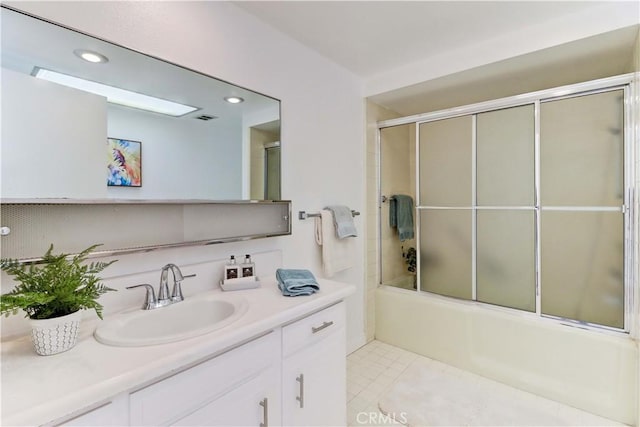 125 Via Estrada Unit B, Laguna Woods, CA 92637 - bathroom with vanity, bath / shower combo with glass door, recessed lighting, and visible vents