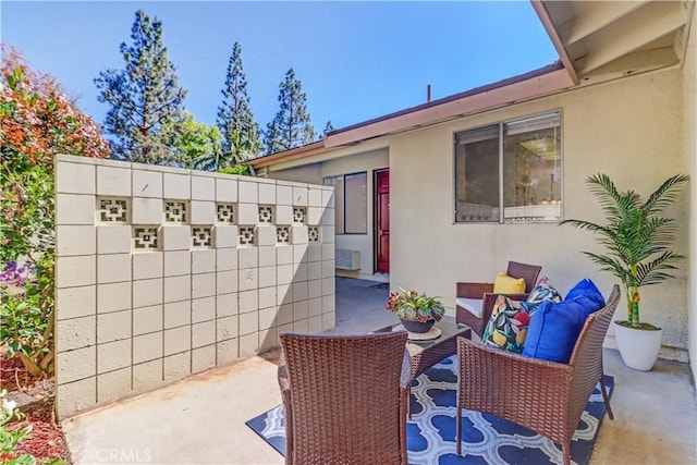 125 Via Estrada Unit B, Laguna Woods, CA 92637 - view of patio with an outdoor hangout area