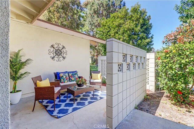 125 Via Estrada Unit B, Laguna Woods, CA 92637 - view of patio / terrace with an outdoor living space