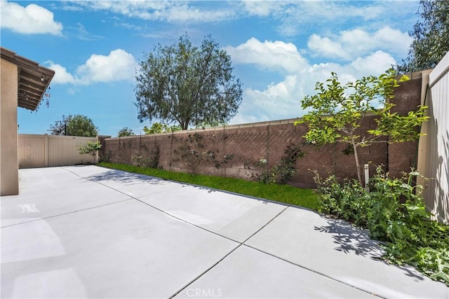 view of patio with a fenced backyard