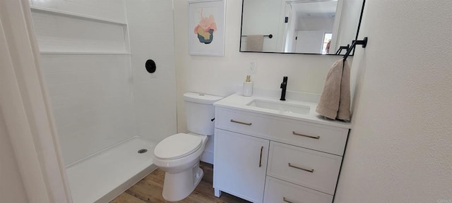 742 Eastshore Unit 98, Chula Vista, CA 91913 - bathroom featuring toilet, vanity, a shower, and wood finished floors