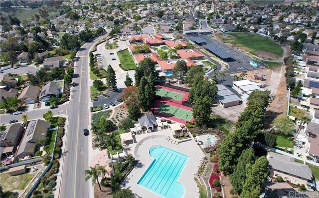 742 Eastshore Unit 98, Chula Vista, CA 91913 - aerial view of property and surrounding area with a pool and nearby suburban area