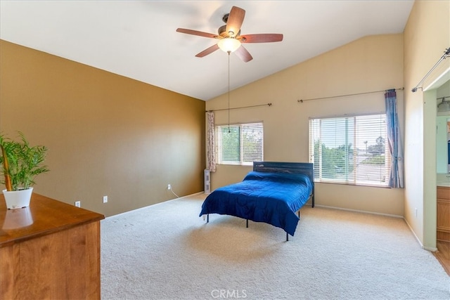 bedroom with baseboards, carpet flooring, a ceiling fan, and vaulted ceiling
